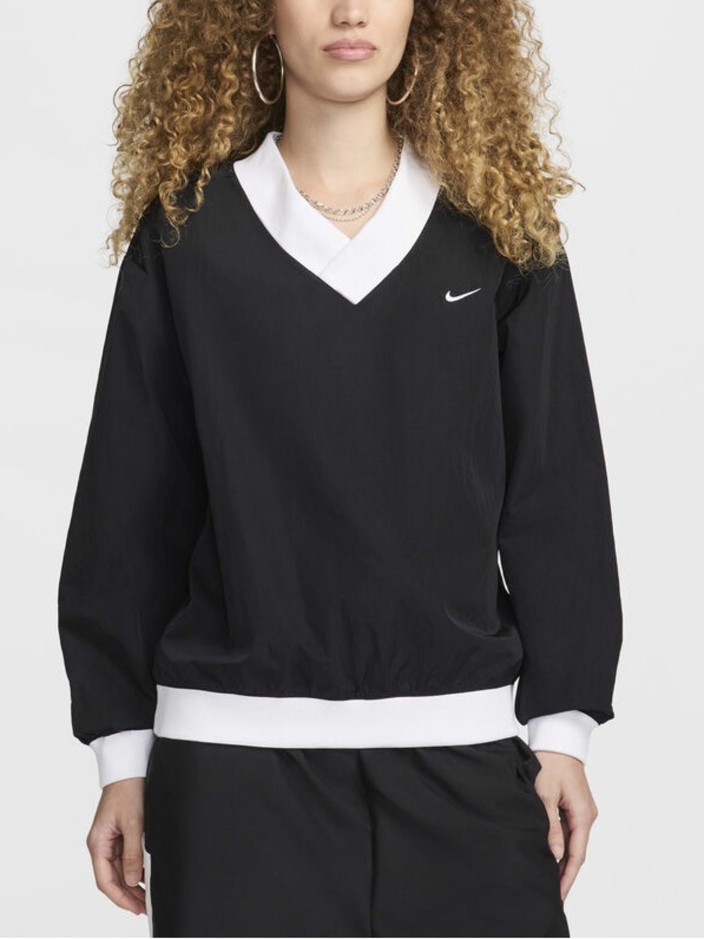 Nike Sportswear Essential
Women's Loose UV Woven Long-Sleeve V-Neck sweater top